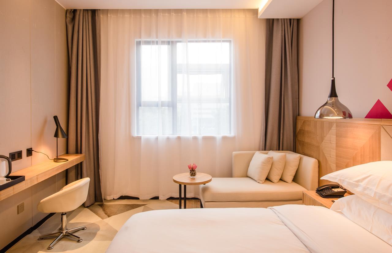 Borrman Hotel Guangzhou Tianhe Sports Center Экстерьер фото