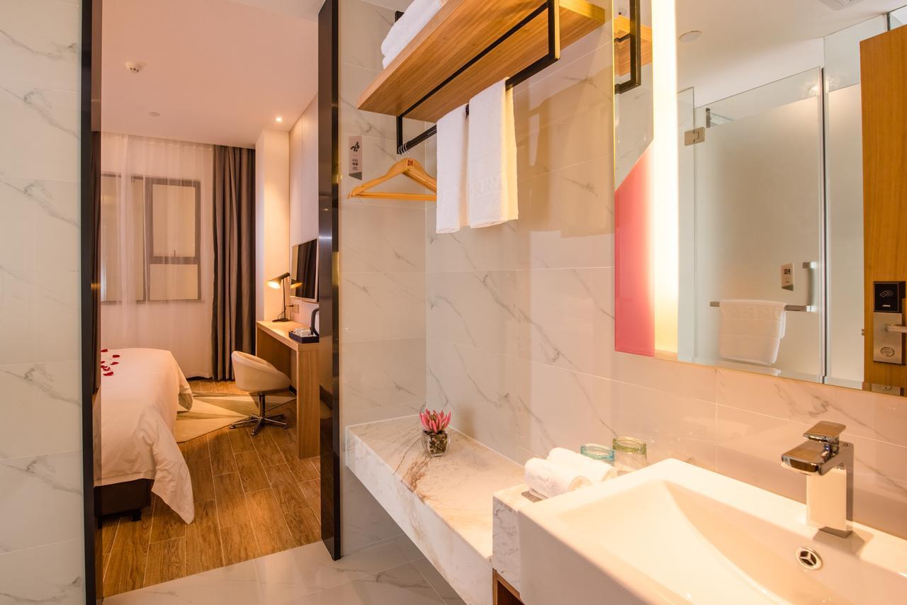 Borrman Hotel Guangzhou Tianhe Sports Center Экстерьер фото
